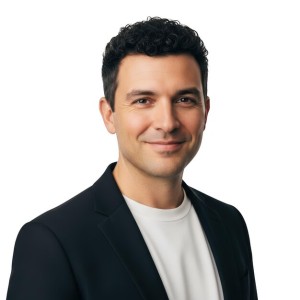 smiling man black blazer headshot white background 990507 38787 (1)